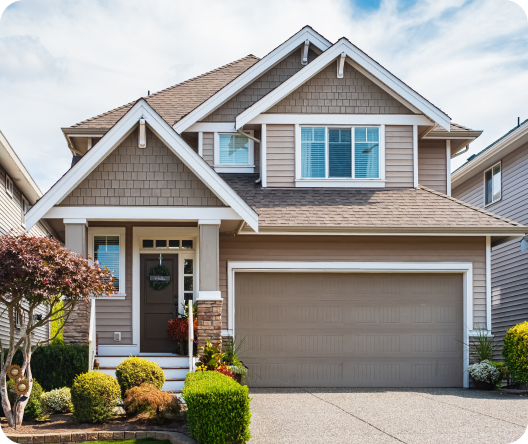 Beautiful house with a garage, well-maintained lawn, and modern design